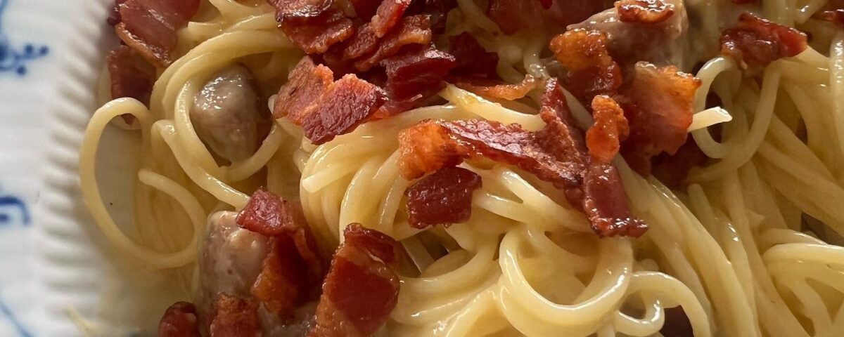 Spaghetti Carbonara with egg yolk  Parmesan and Gruyere Cheese...