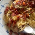 Spaghetti Carbonara with egg yolk  Parmesan and Gruyere Cheese...